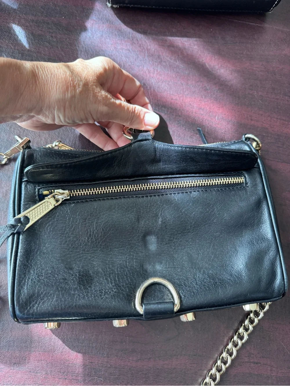 Rebecca Minkoff Mini M.A.C. crossbody bag featuring black Gold tone hardware